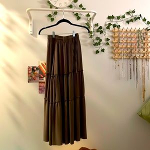 Adjustable waist long vintage dark brown with hints of green skirt.